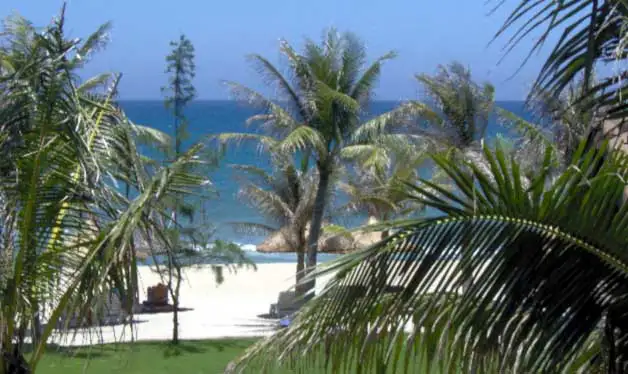 Palmiers et plage du Palm Garden resort au bord de la mer, à Hoi An